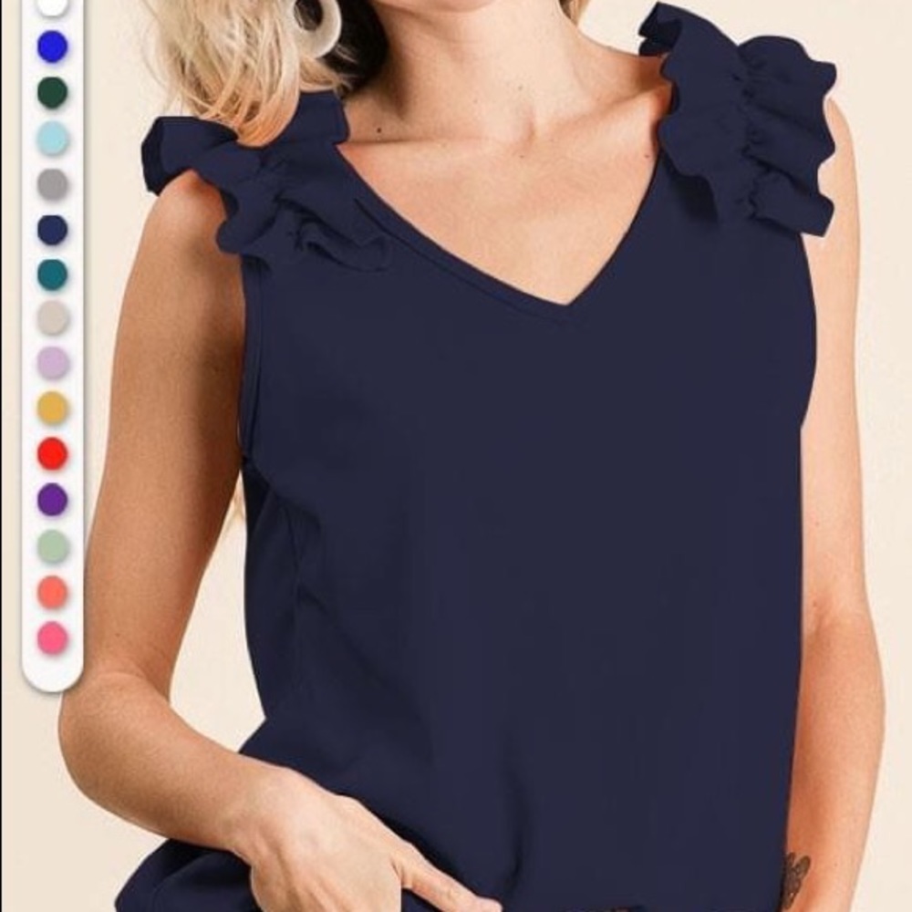 V NECK TOP WITH RUFFLE APPLIQUE AT SHOULDER